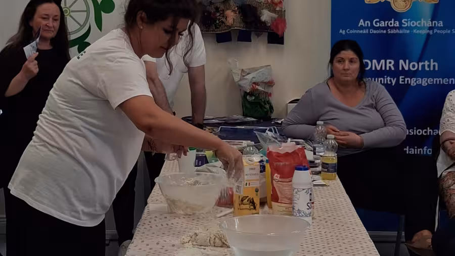 Maggie McDonagh demonstrating how to make bread at the Balbriggan Traveller Pride Event