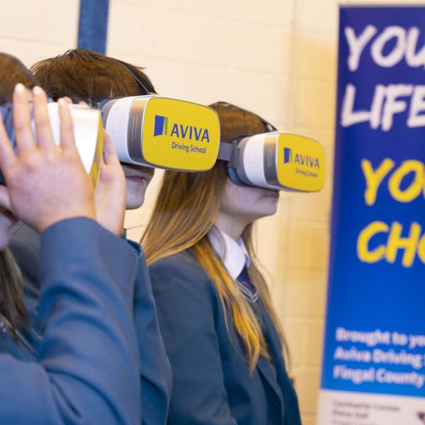 Students trying out the VR headsets at launch of Your Life - Your Choice
