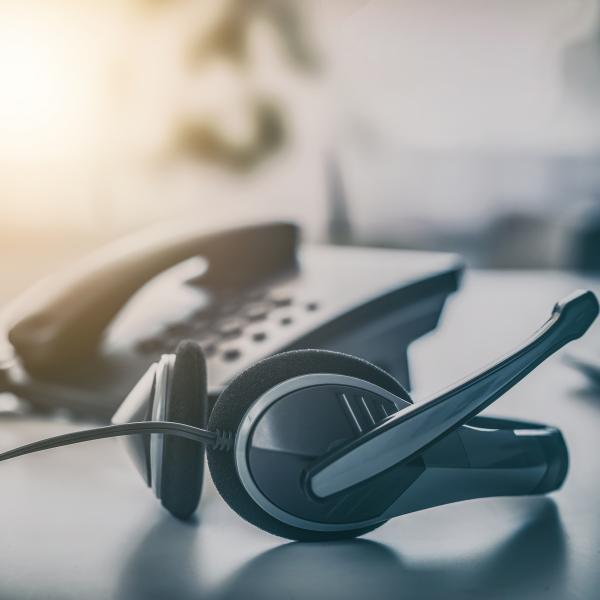 Photo of a phone and a headset