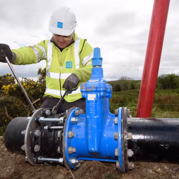 Image of man working on a watermain