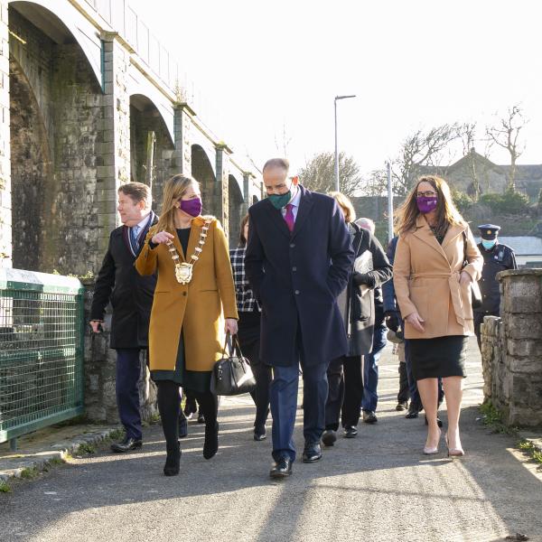 Mayor of Fingal Cllr Seána Ó Rodaigh leads An Taoiseach Micheál Martin TD towards the Balbriggan Beach and Harbour during their walkabout to view projects under the Our Balbriggan Regeneration Scheme.