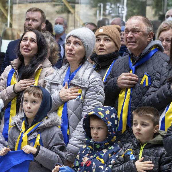 Members of the Ukrainian community sing their national anthem during the raising of the Ukraine flag at County Hall, Swords, today. 