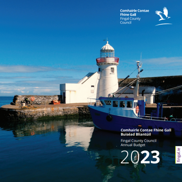 Picture of the front and back cover fo the 2023 Budget Book which features a photograph of Balbriggan Harbour and Lighthouse