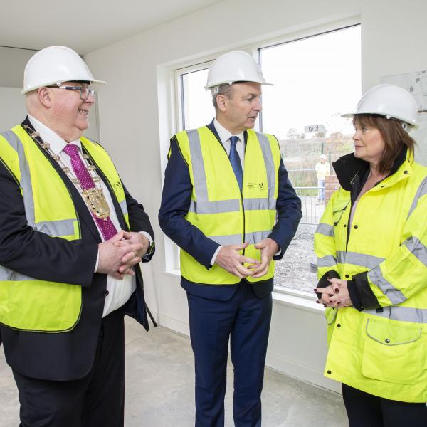 Mayor of Fingal, Cllr Howard Mahony, Taoiseach Michéal Martin and Fingal County Council Chief Executive AnnMarie Farrelly pictured during a visit to the Council's Housing Development at Church Fields, Dublin 15.
