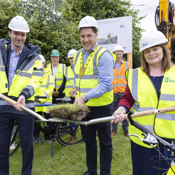 mayor turns sod on spade 