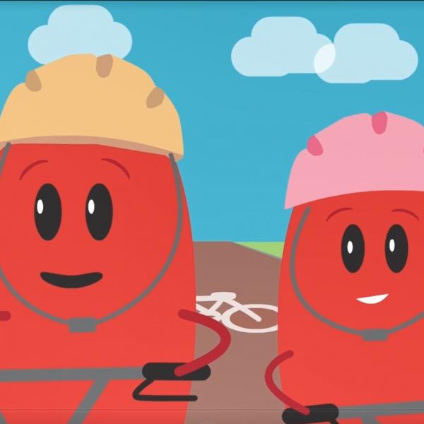 two beings on bikes