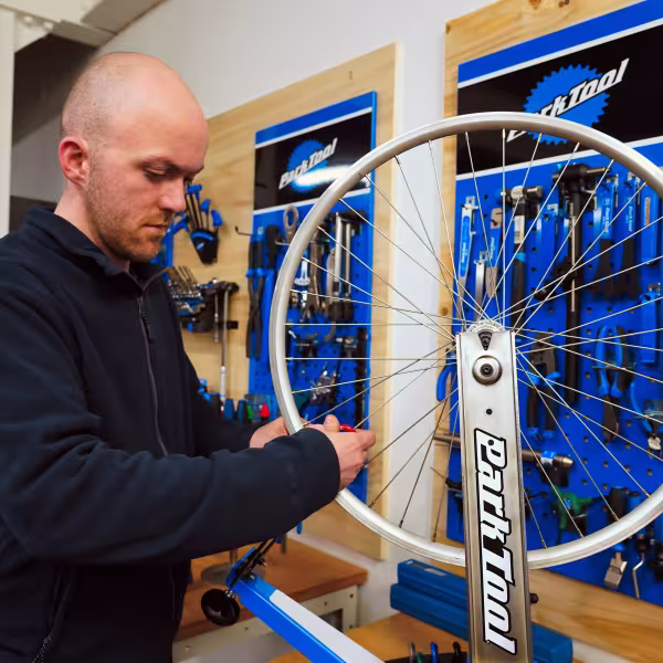 Team member from Rediscovery Centre Ballymun working on a bike