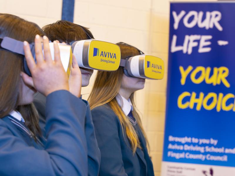 Students trying out the VR headsets at launch of Your Life - Your Choice