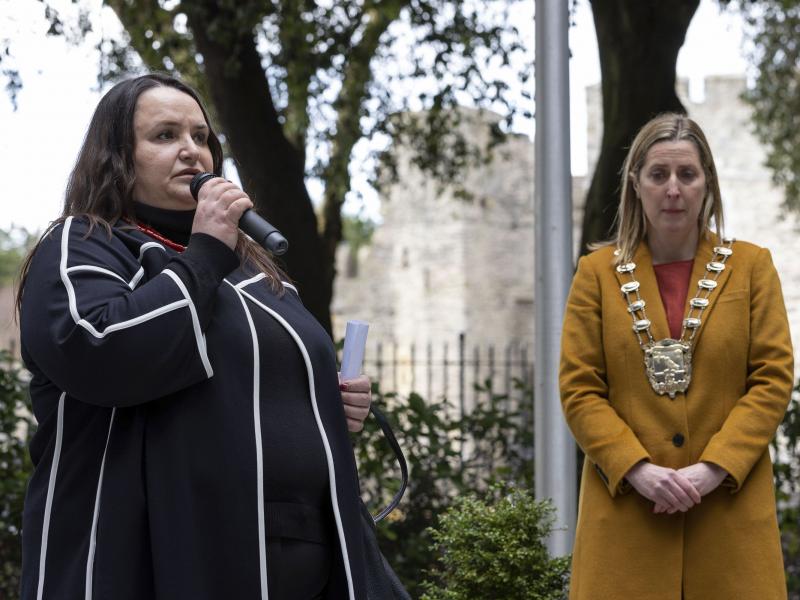 The Ukrainian Ambassador to Ireland, Her Excellency Ms Larysa Gerasko, addresses the crowd outside County Hall, Swords, watched by the Mayor of Fingal, Cllr Seána Ó Rodaigh.