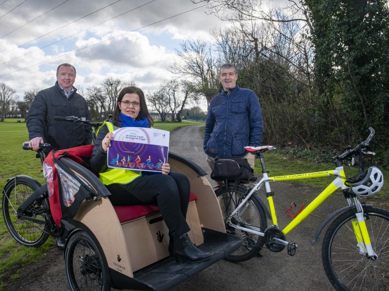 Active Travel team pose with strategy and vechicles