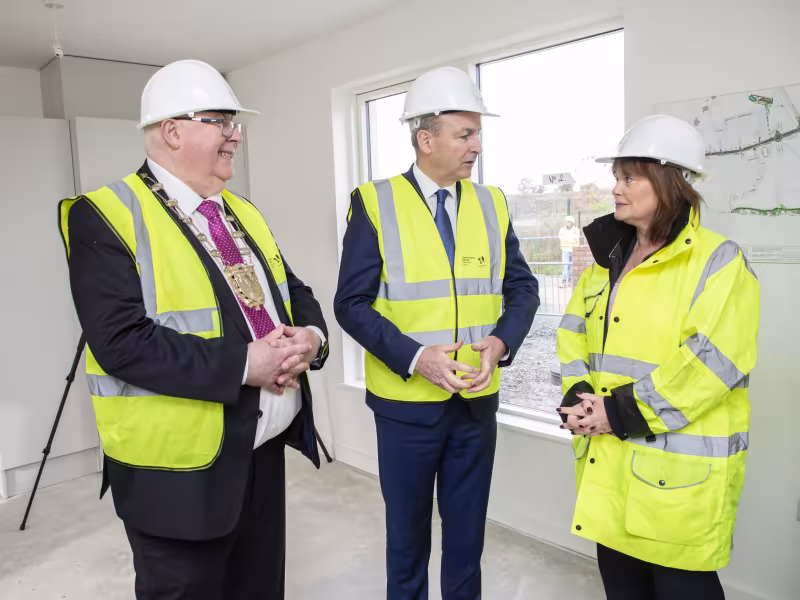 Mayor of Fingal, Cllr Howard Mahony, Taoiseach Michéal Martin and Fingal County Council Chief Executive AnnMarie Farrelly pictured during a visit to the Council's Housing Development at Church Fields, Dublin 15.