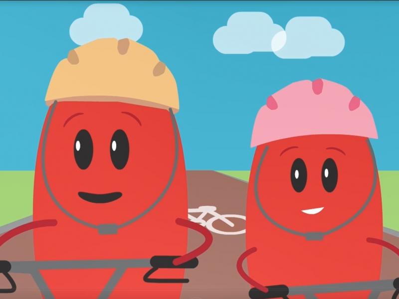 two beings on bikes