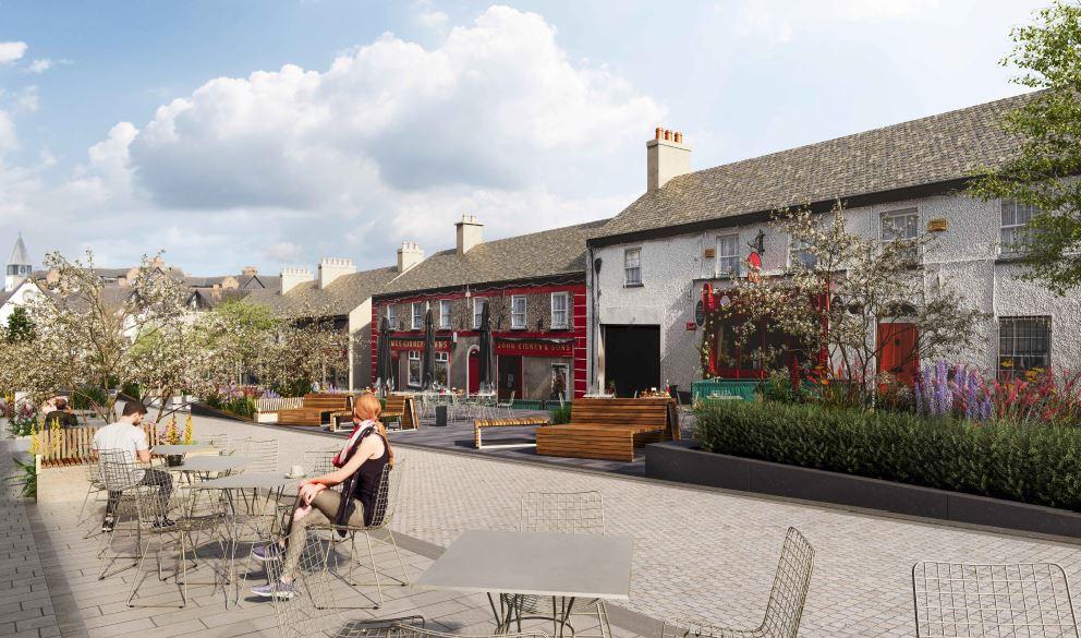 pedestrian street with cafe tables and planting