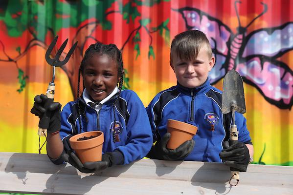 Young gardeners from St Patrick's National School Corduff dig in