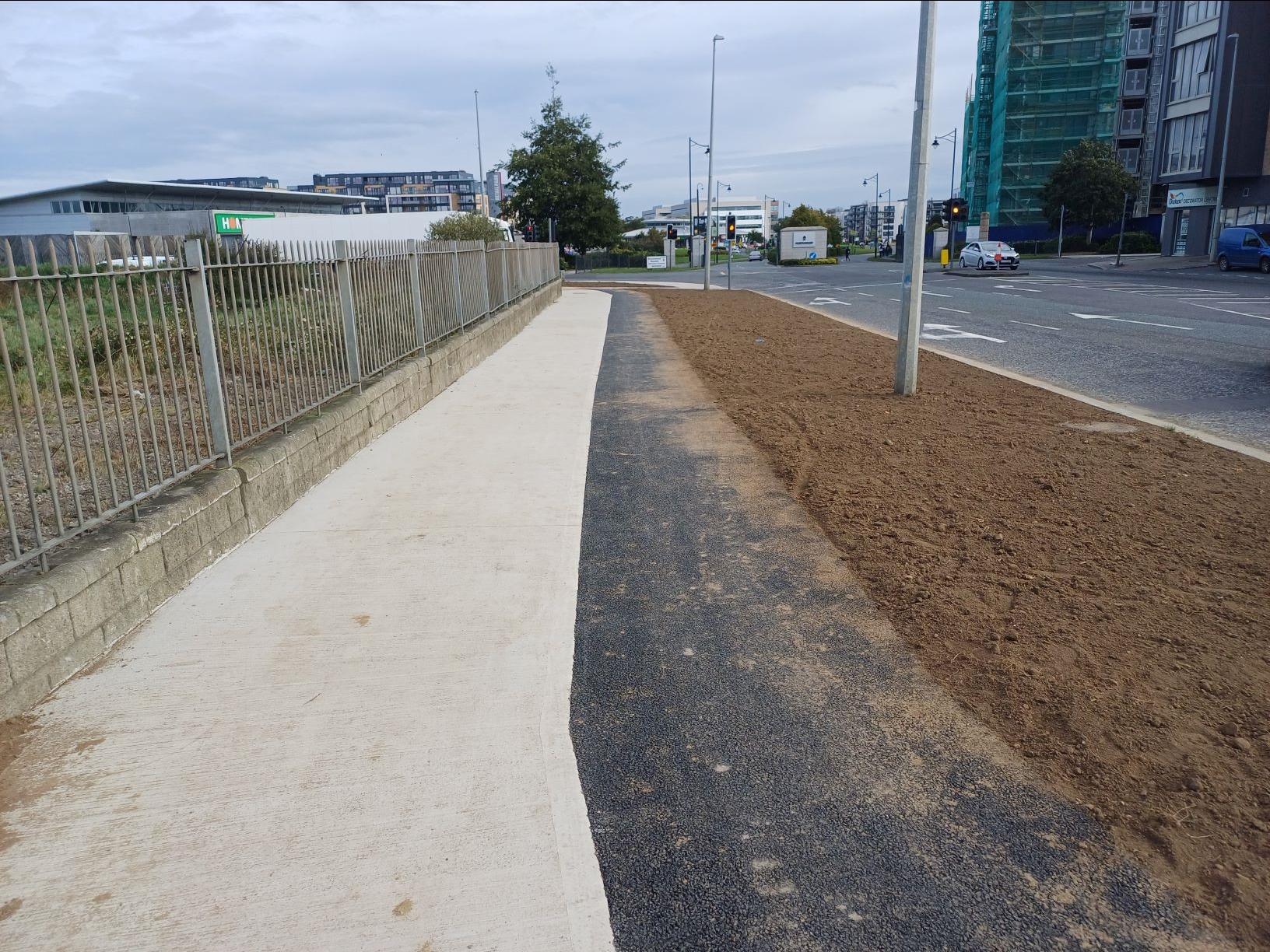 Photo of upgraded path and cycle path with tactile dished pavement