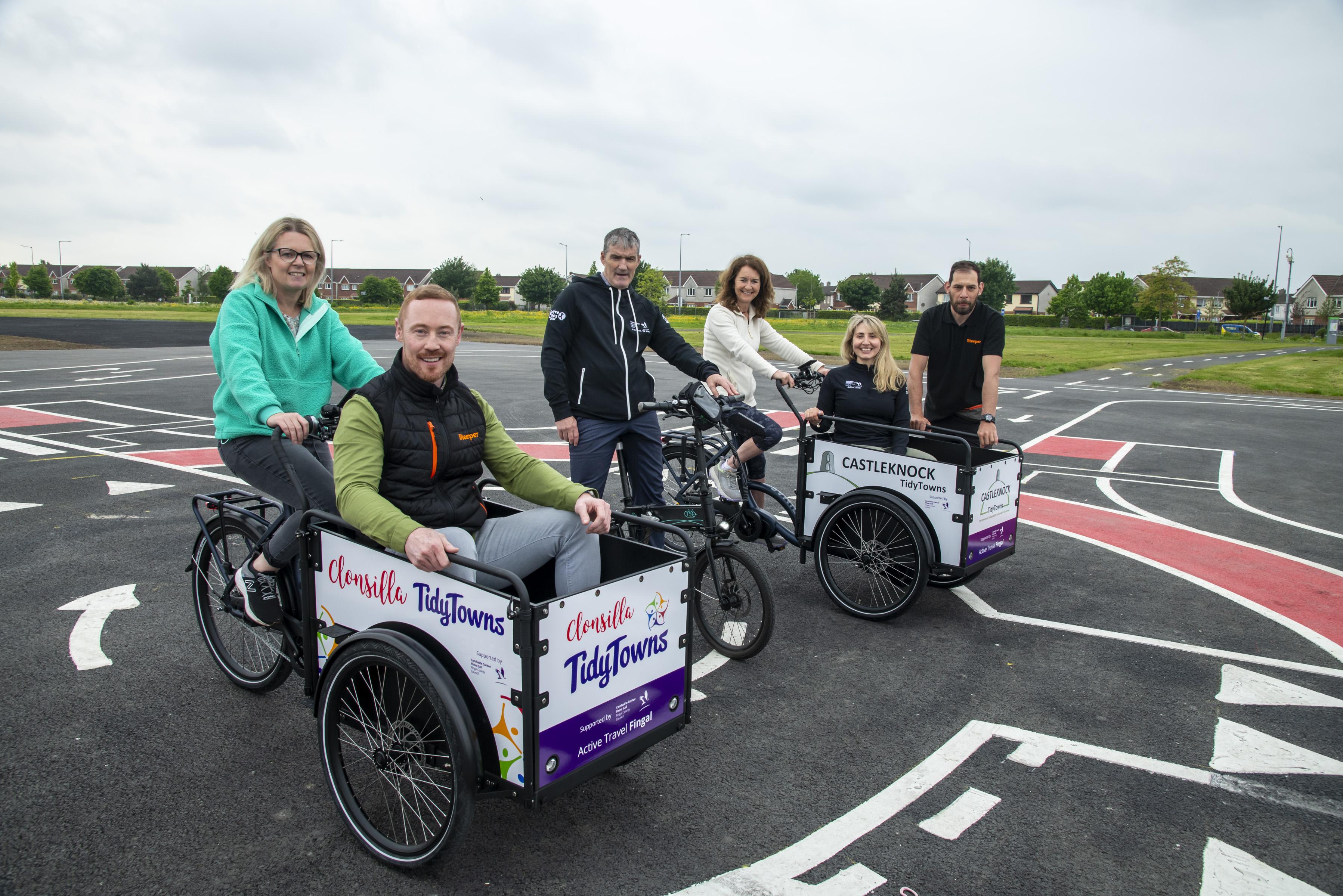 People sitting in cargo bikes