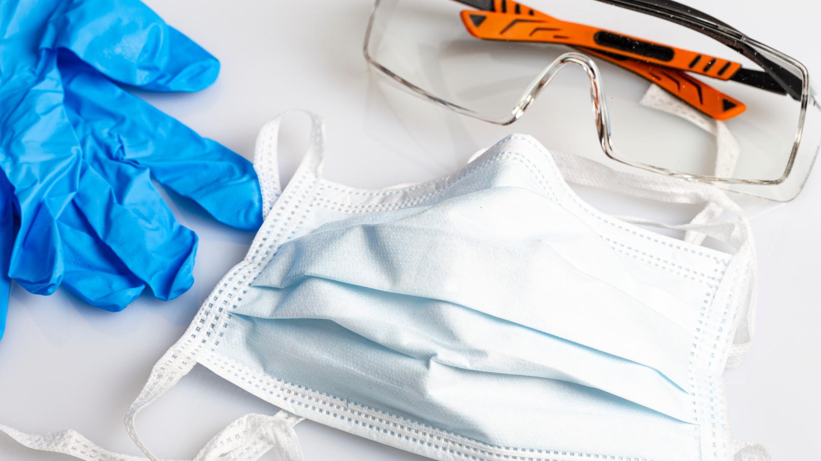 Photo of PPE mask, gloves and glasses