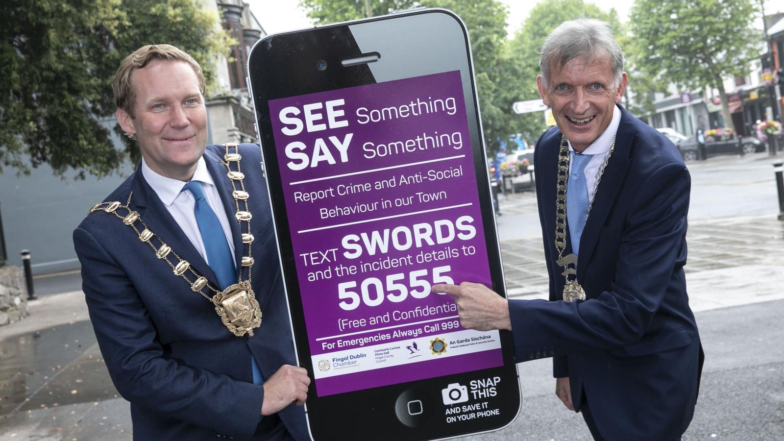 Mayor of Fingal Cllr Eoghan O'Brien and Fingal Dublin Chamber President Bill Kearney promoting the new text alert service