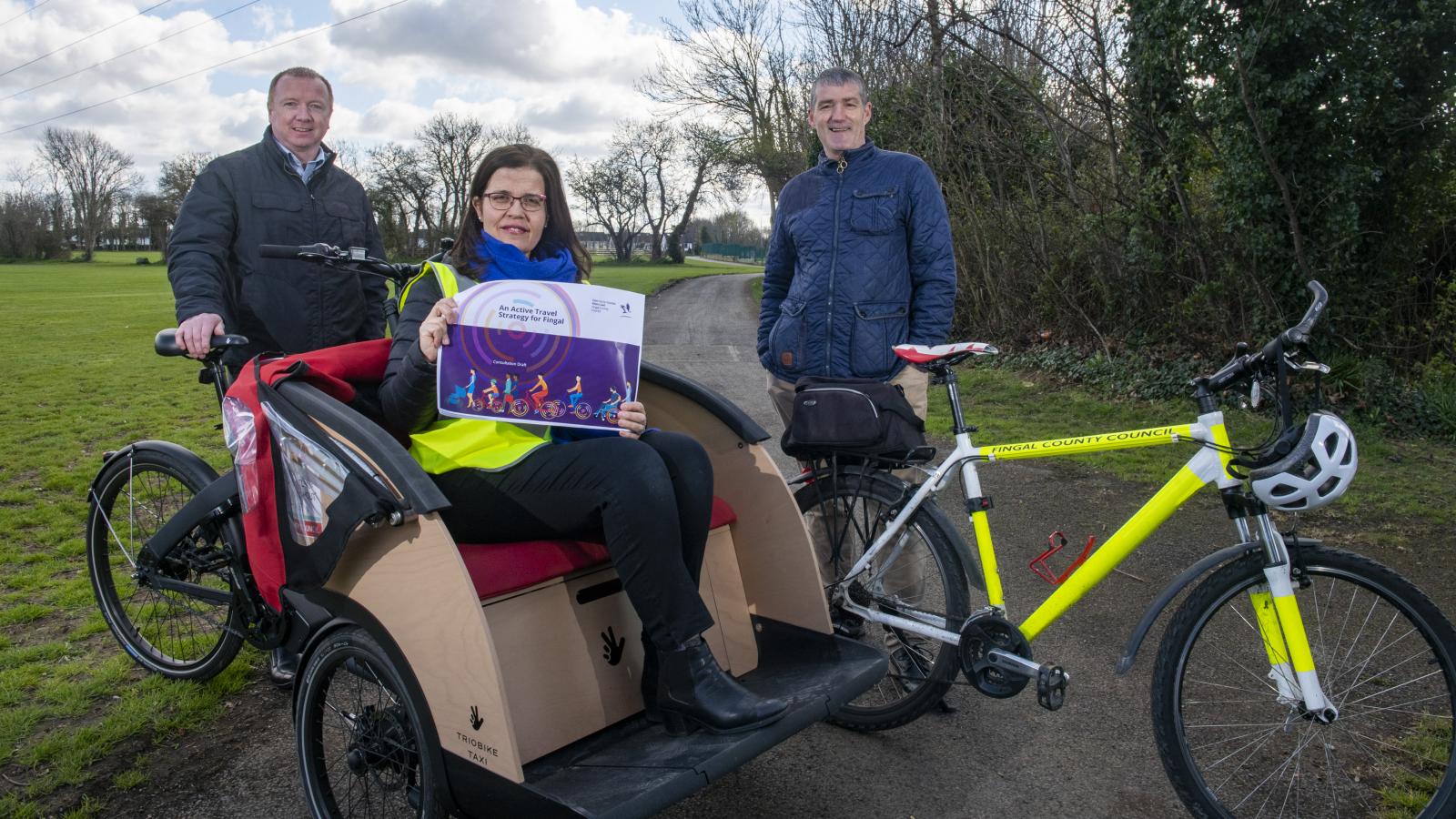 Active Travel team pose with strategy and vechicles